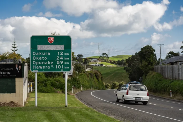 Taranaki Story 165 Visit Live Surf Highway 45 car with surfboard